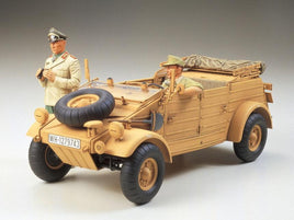 Model of tan WWII German military Kubelwagen with two soldier figures, one seated and one standing