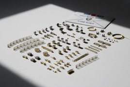 1/350 scale Gold Medal Models naval ship accessories including photo-etched brass railings, gun turrets, fire control directors, Oerlikon and Bofors mounts, radar equipment on white background
