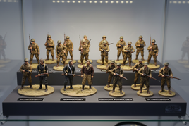 1/72 scale model military figures collection display with British, German, American soldiers