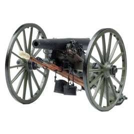 Miniature vintage artillery cannon model with large wooden wheels and attached tools