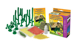 Desert plants craft kit with foam cactus models, colored sand, glue, and instruction booklet