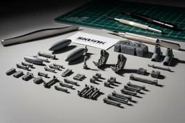 1/48 scale Skunk Models Workshop aftermarket aircraft parts including resin missiles weapons and detail upgrades on modeling workbench