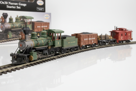 On30 narrow gauge model train set with green Rio Grande locomotive, freight and caboose on track