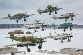 Realistic model aircraft kits from MPM Hobbies on a snowy diorama with assembly tools.