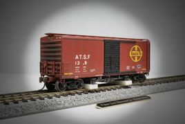 N scale track cleaning boxcar with cleaning pad mechanism on detailed model railroad track with ballast