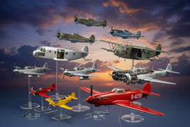 Scale model airplanes displayed on stands with sunset background, MPM Hobbies 3D printed kits