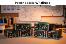 Model railroad power boosters on workbench, MPM Hobbies model train accessories