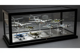 Display case with diecast model airplanes, collectible aircraft, hobby store showcase