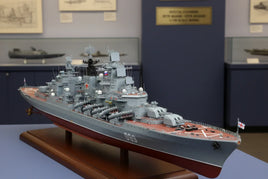 Detailed scale model warship on display at MPM Hobbies, featuring military ship design.