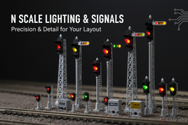 N scale model railroad signal masts and lighting accessories including searchlight signals and dwarf signals from Digitrax and Tomar Industries on track background