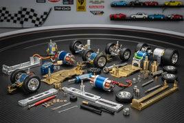 Slot car parts and chassis kits on tabletop, MPM Hobbies model racing components