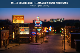 N scale model street scene at dusk with illuminated vintage signs, bar and grill, motel, and billboards, from MPM Hobbies.