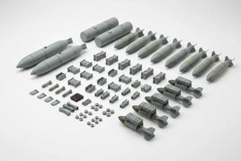 1/32 scale Flying Leathernecks aircraft weapons and ordnance including AV-8B Harrier pylons, LAU missile launchers, Mk-82/83/84 bombs and GBU-32 JDAM resin parts on white background