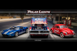 Three 1/25 scale Polar Lights model cars on a racetrack, including a blue sports car, a custom muscle car, and a red Coca-Cola Volkswagen, from MPM Hobbies' automotive kits collection.