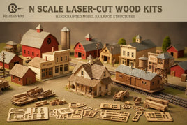 N scale laser-cut wood kits for model railroad structures, featuring detailed miniature buildings and assembly parts on display, available at MPM Hobbies.