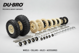 Professional display of DU-BRO R/C aircraft wheels ranging from 1.23-inch micro to 8-inch large scale treaded variants, wheel collars, and axle accessories arranged on clean background for radio-controlled aircraft modeling enthusiasts