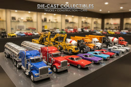 Die-cast collectible model trucks, construction vehicles, and cars on display at MPM Hobbies.