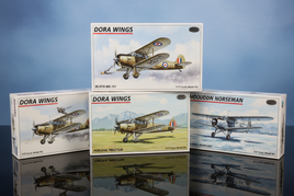 Display of 1/72 Dora Wings propeller aircraft model kits featuring Bloch MB.151, Percival Proctor, Bellanca Skyrocket, and Noorduyn Norseman boxes with detailed aviation artwork