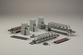 MPM Hobbies 3D printed model railroad bridge set with gray truss bridges, piers, and track pieces.
