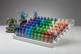 Acrylic paint rack with assorted model paints and painted fantasy miniatures, MPM Hobbies