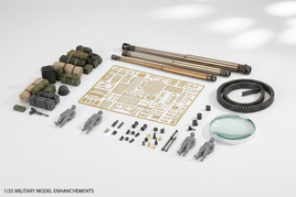 Tamiya 1/35 armor detail parts: metal gun barrels, photo-etched brass grilles, track links, stowage accessories on white