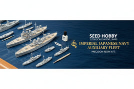 1/700 scale Imperial Japanese Navy auxiliary fleet model ships, tools, and paint on blue surface.