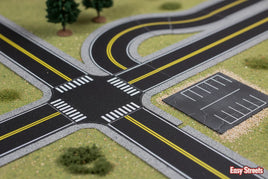 Miniature road intersection and parking lot diorama with Easy Streets branding, MPM Hobbies.