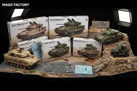 Model military vehicle kits and sprues displayed on diorama terrain, Magic Factory, MPM Hobbies