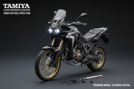 Tamiya 1/6 scale Honda CRF1000L Africa Twin model motorcycle with assembly parts, premium detail