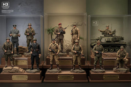 Display of detailed military miniature figures and tank models from different war eras at MPM Hobbies
