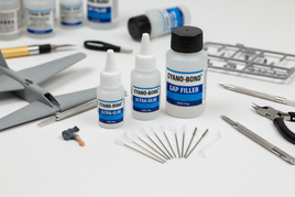 Cyano-Bond Ultra Glue and Gap Filler for hobby model kits with tools and plastic airplane