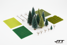 Z scale JTT scenery products including miniature pine trees, grass mats in green shades, and professional tree armatures on white background