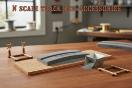 N scale track-bed accessories with model train parts and ballast on a hobby workbench at MPM Hobbies