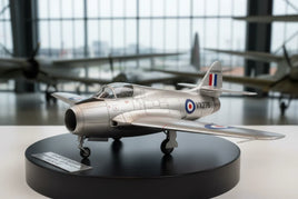 Silver model jet airplane with RAF markings on display stand, MPM Hobbies 3D printed product.