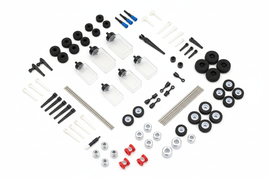 Assortment of DU-BRO R/C aircraft accessories including fuel tanks, control horns, treaded wheels, threaded rods, E/Z connectors, and prop nuts arranged on a white background
