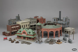 HO scale model train buildings and accessories with general store, station, water tower, roundhouse, and industrial structures from MPM Hobbies.