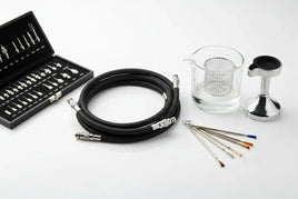 Professional Vigiart airbrush accessories: braided hoses, chrome quick-disconnect fittings, precision needles, glass cleaning pot, metal holder, brush set on white surface