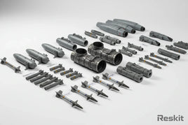 1/32 scale Reskit 3D printed aircraft aftermarket resin parts including F-14 Tomcat exhaust nozzles, F/A-18 fuel tanks, AIM-9 Sidewinder missiles and gun pods on white background