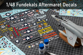 1/48 scale model aircraft Fundekals aftermarket decals with tools and jet on hobby workspace