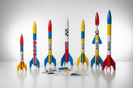 Colorful Quest model rockets and building tools displayed on a white surface at MPM Hobbies