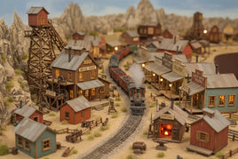 Detailed model train set with Old West buildings, tracks, and shops from MPM Hobbies collection