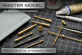 Precision metal aircraft model parts and tools on grid mat, 1/48 scale, MPM Hobbies
