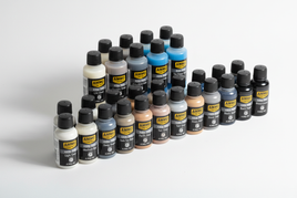 Assorted AMMO Mig Washes hobby paint bottles arranged on a white background, MPM Hobbies
