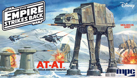 Star Wars Empire Strikes Back AT-AT model kit box art showing armored transport attacking snowy battlefield