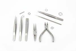 Professional tweezers and pliers for scale modeling including pointed curved slant tip tweezers and needle nose flat nose round nose pliers on white background