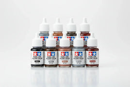Tamiya panel line accent color enamel paints set, various shades, on white background, MPM Hobbies