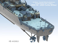 Model of a US Navy guided missile destroyer with text indicating class and name.