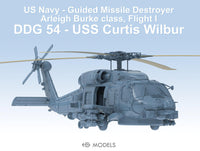 Model of a US Navy guided missile destroyer with text detailing its classification and name.