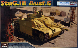 Model of a StuG III Ausf G tank with a desert landscape background, featuring Gallery Models branding.