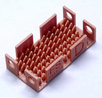 Red plastic component with 'FS' branding on a white background